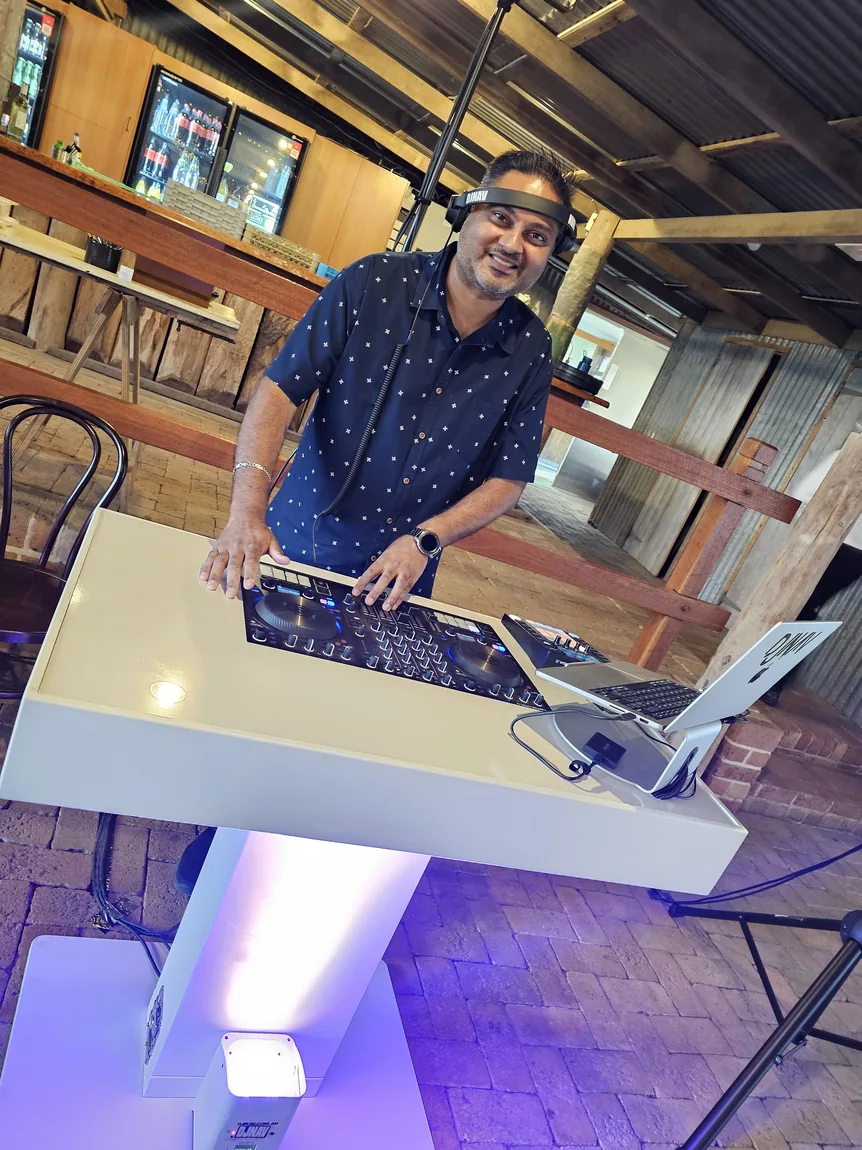 Real photo of DJNav DJing at a wedding event