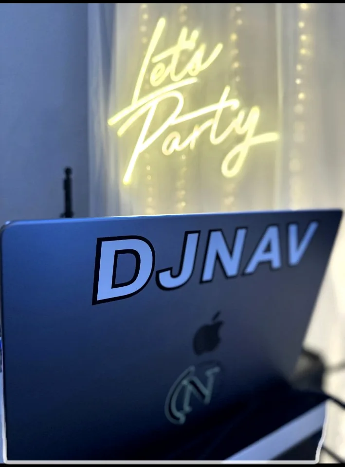 DJNav laptop with party sign